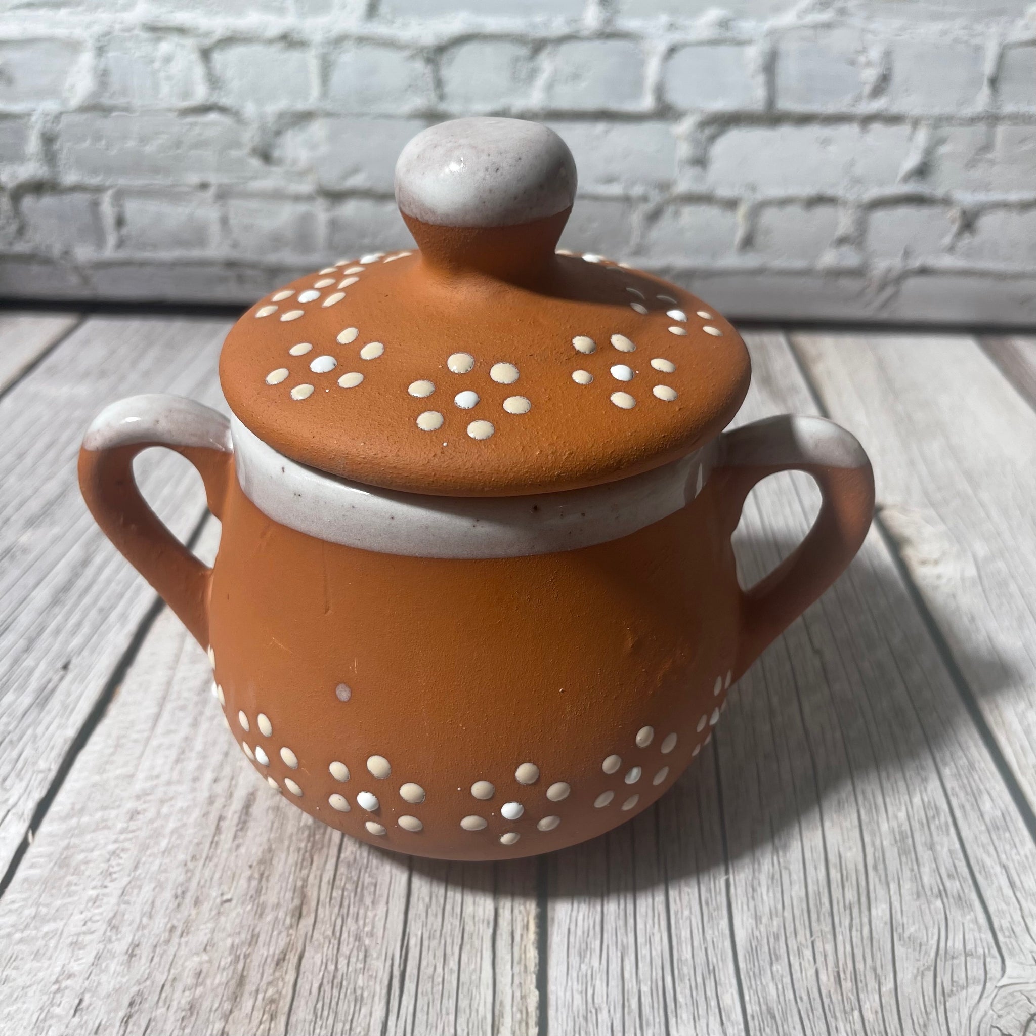 16 oz handcrafted soy candle in white trimmed Mexican Clay Tacita with lid.